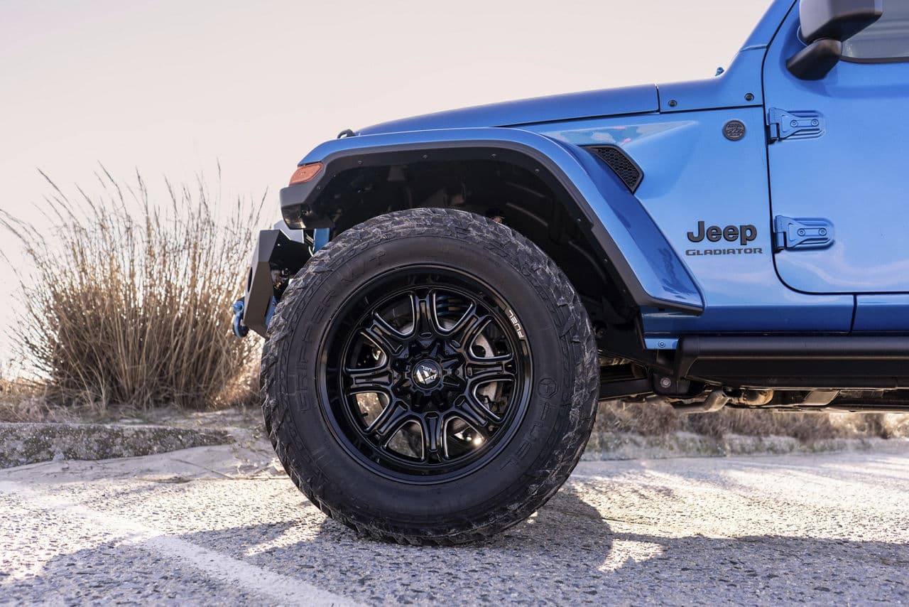 Front view of 2021 Jeep Gladiator with truck suv wheels