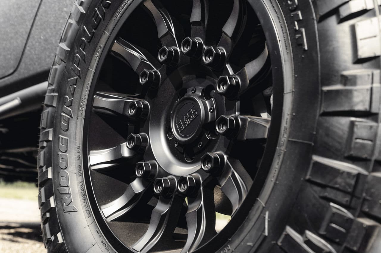 Detail view of 2021 Jeep Wrangler with truck suv wheels