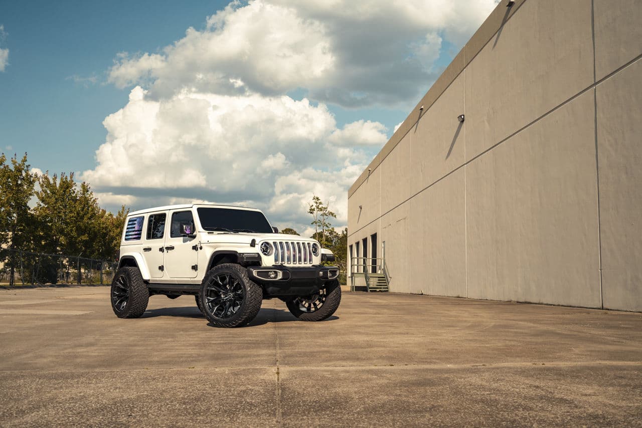 Side profile of 2021 Jeep Wrangler with truck suv wheels