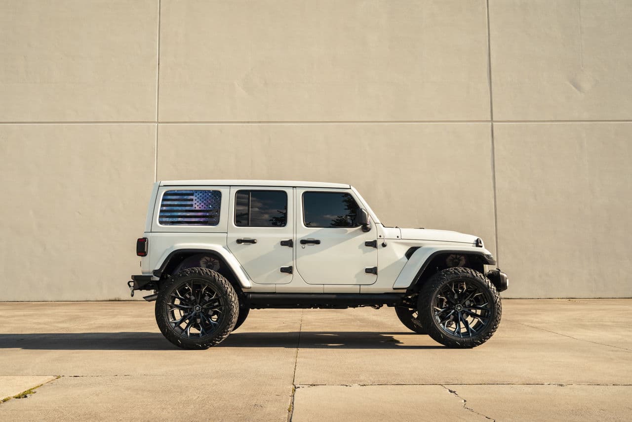 Rear view of 2021 Jeep Wrangler with truck suv wheels