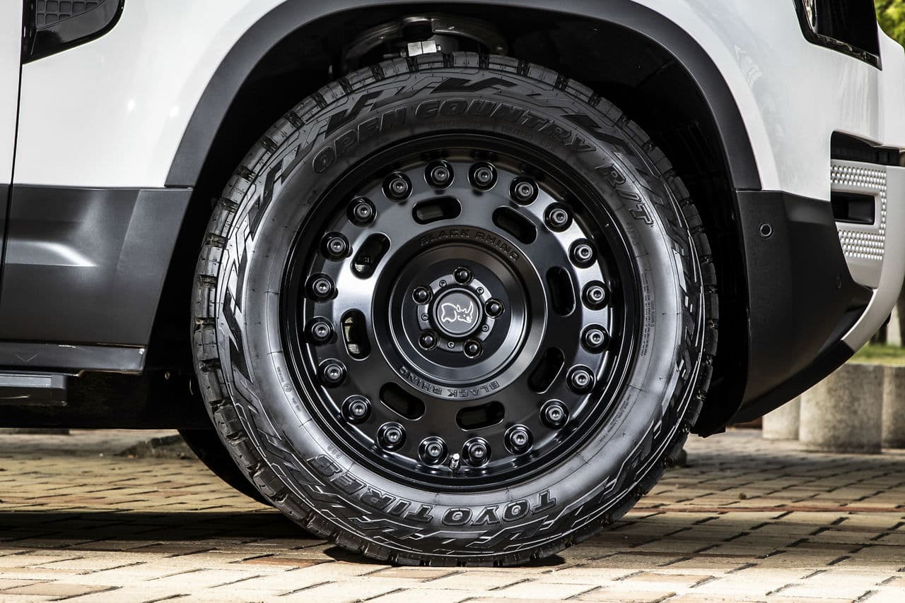 Side profile of 2021 Land Rover Defender with wheels