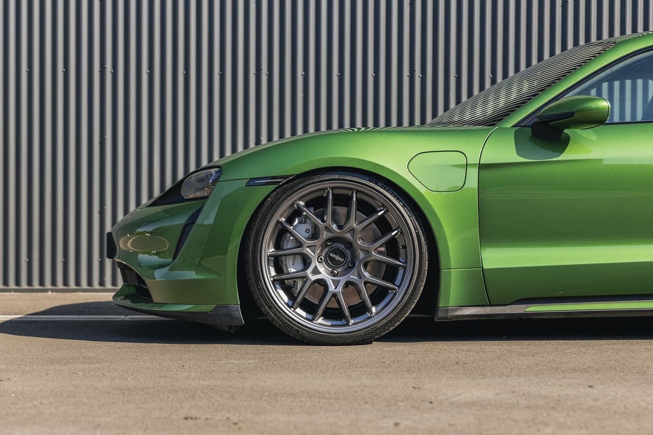 Detail view of 2021 Porsche Taycan with wheels