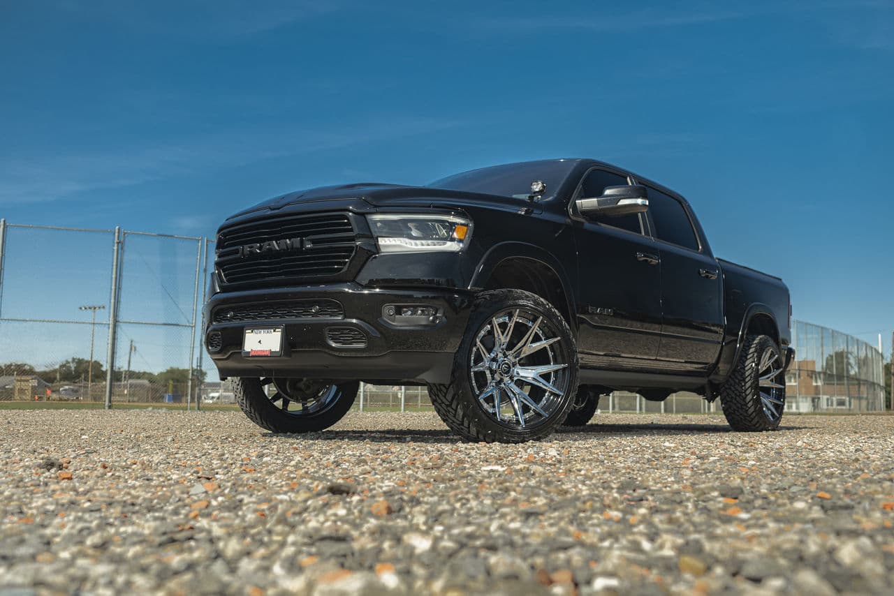 Front view of 2021 Ram 1500 Laramie with truck suv wheels