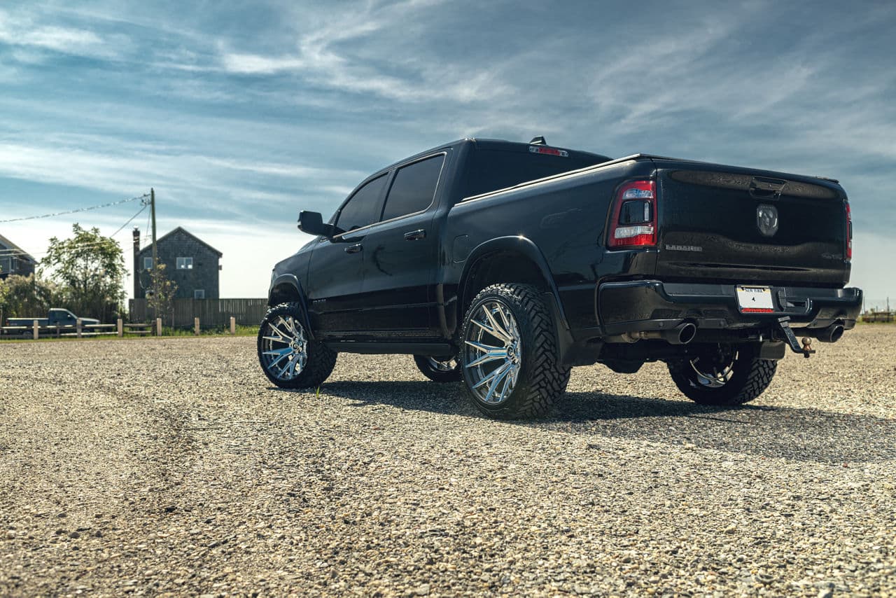 Side profile of 2021 Ram 1500 Laramie with truck suv wheels