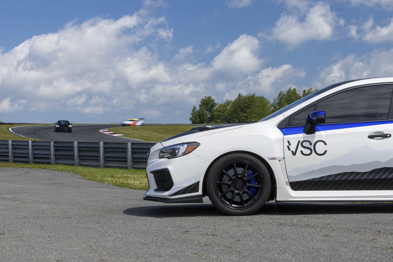 Side profile of 2021 Subaru WRX STI with tuner wheels
