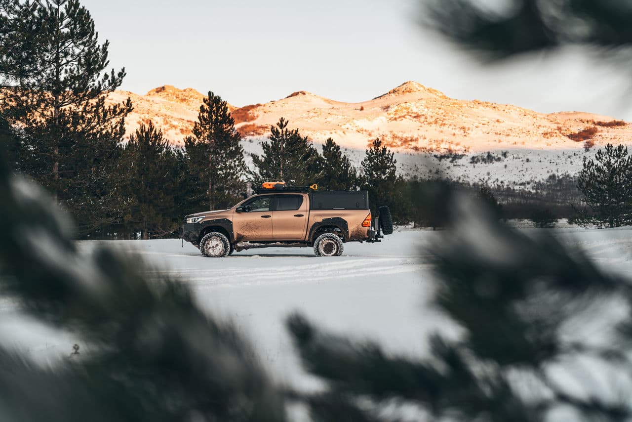 Side profile of 2021 Toyota Hilux with truck suv wheels