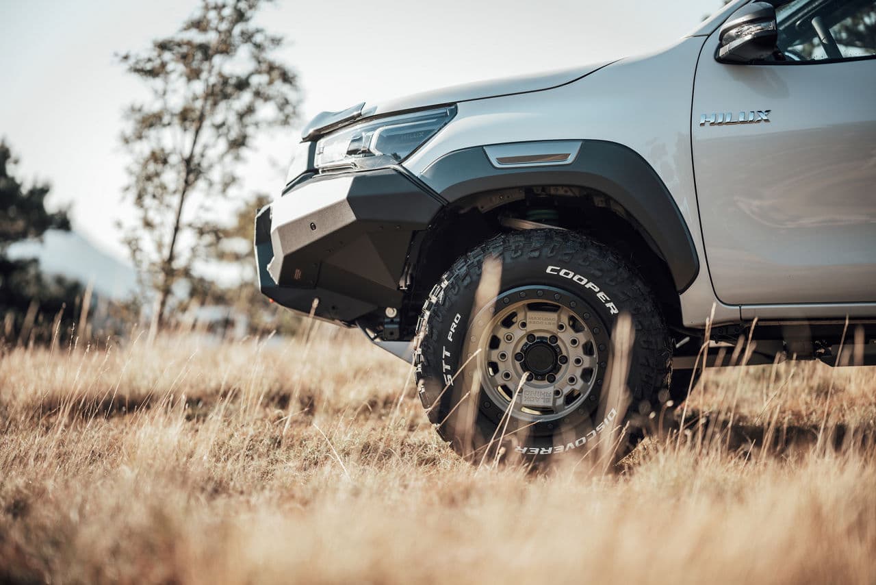 Side profile of 2021 Toyota Hilux with wheels