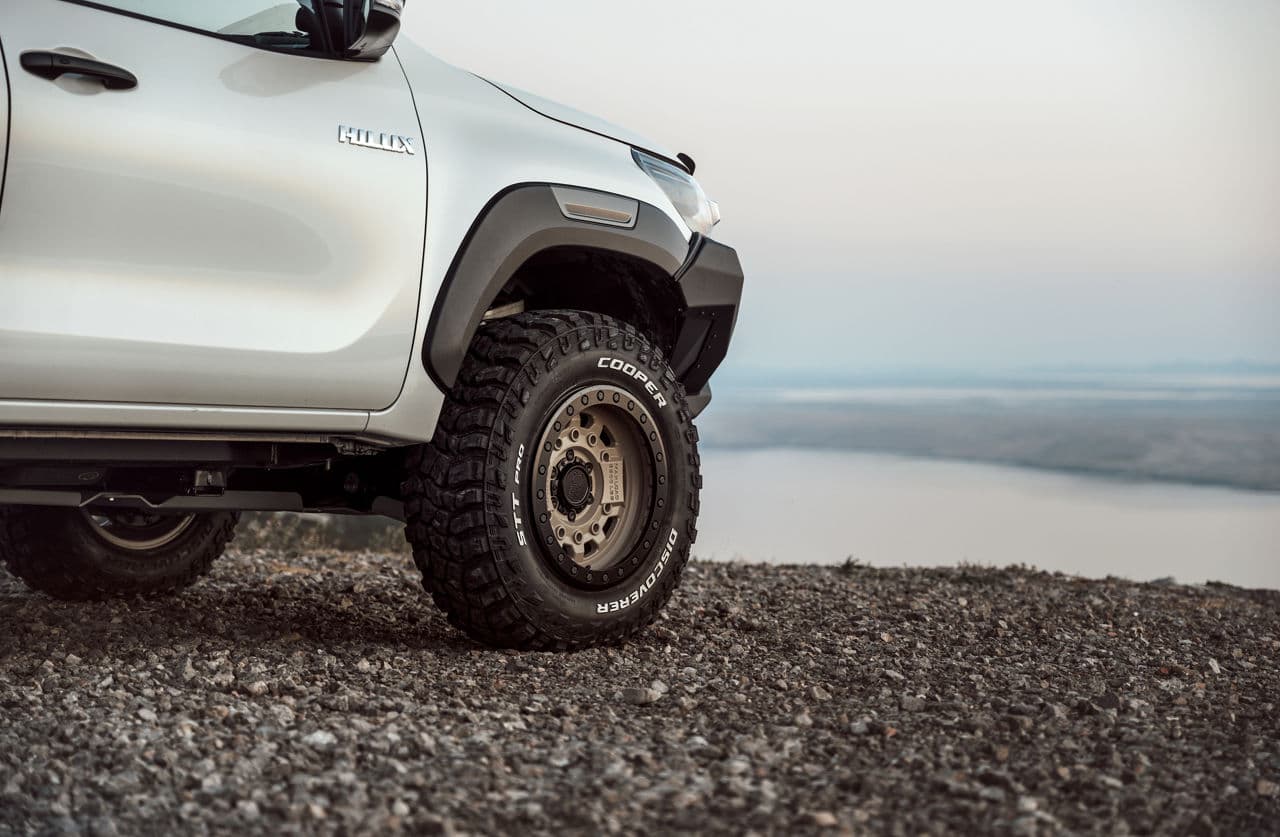 Rear view of 2021 Toyota Hilux with wheels