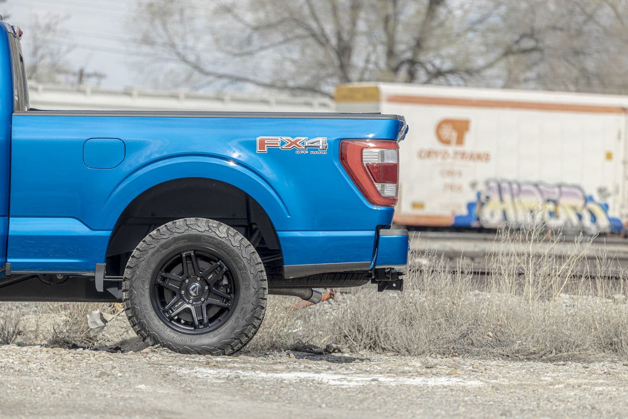 Rear view of 2022 Ford F150 Lariat with wheels