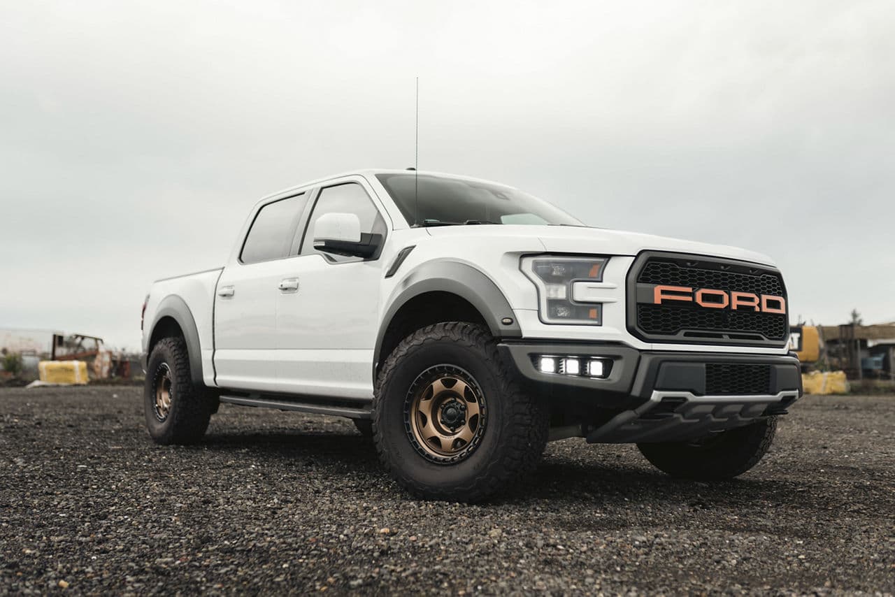Side profile of 2022 Ford F150 Raptor with truck suv wheels