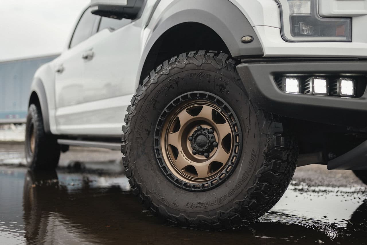 Rear view of 2022 Ford F150 Raptor with truck suv wheels