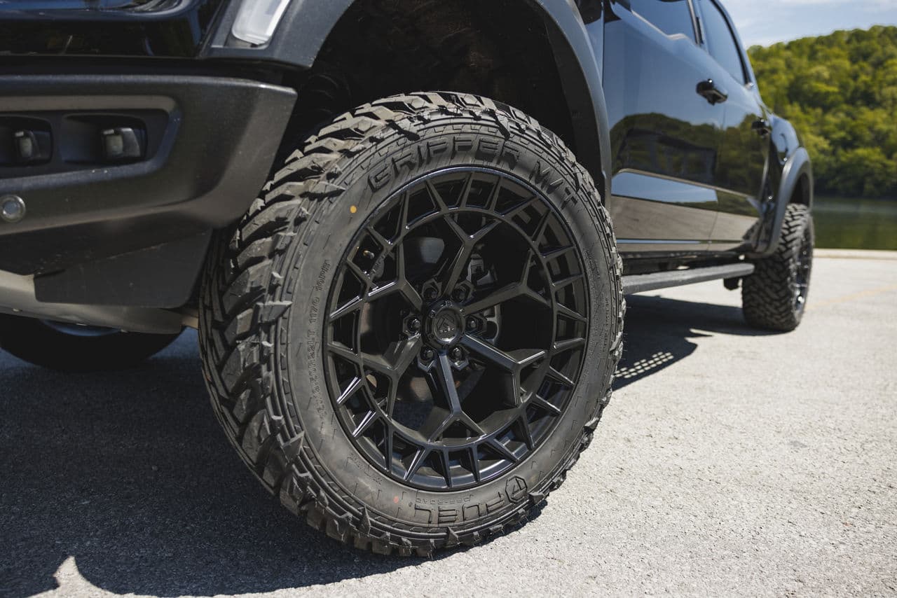 Side profile of 2022 Ford F150 Raptor with truck suv wheels