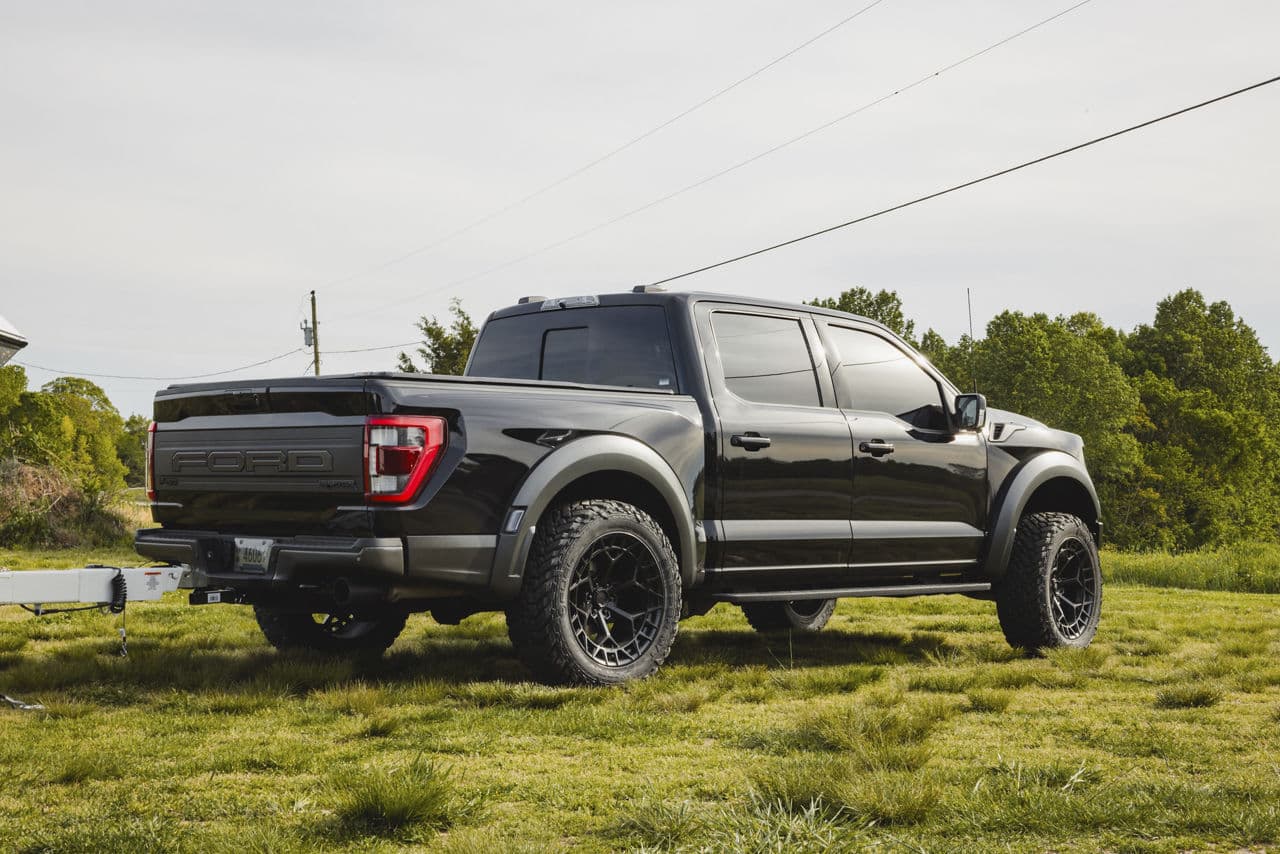 Rear view of 2022 Ford F150 Raptor with truck suv wheels