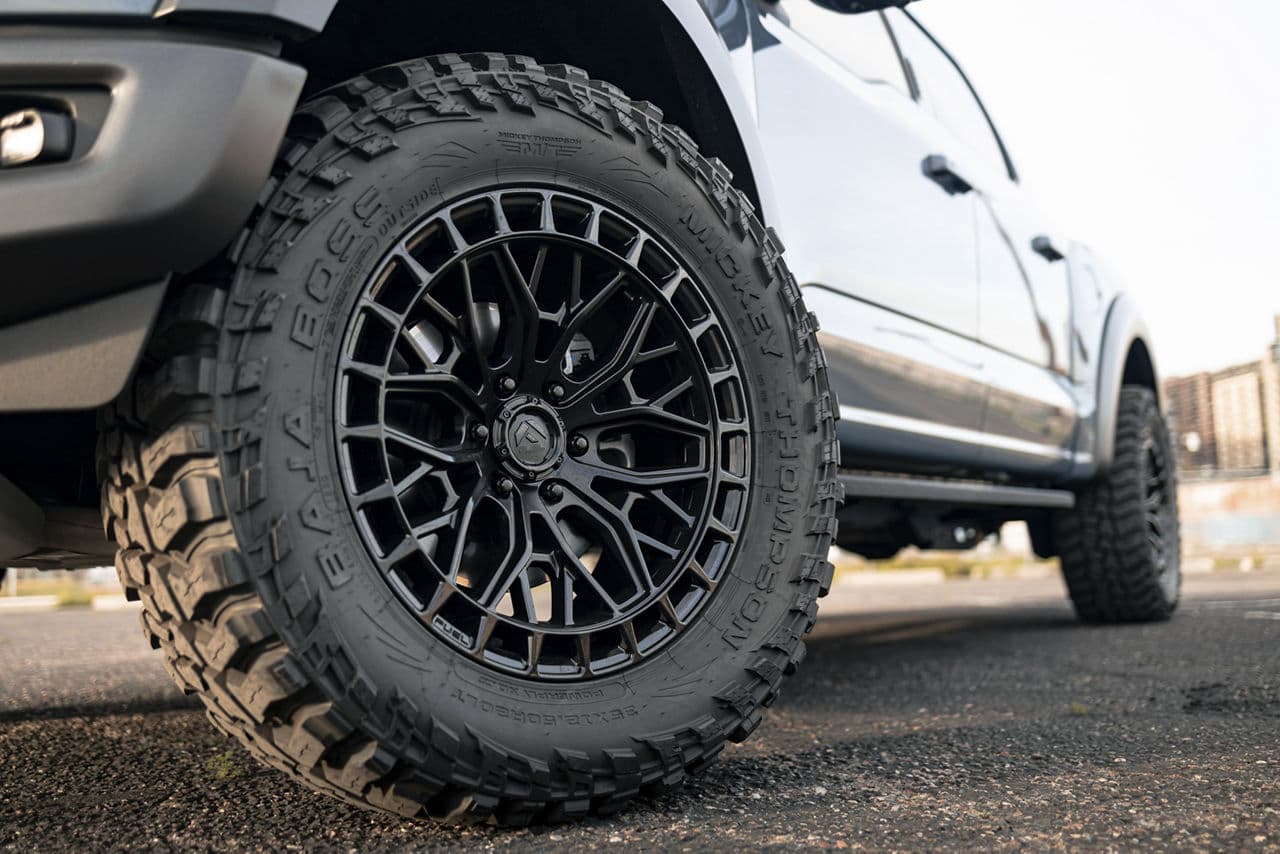 Side profile of 2022 Ford F150 Raptor with truck suv wheels