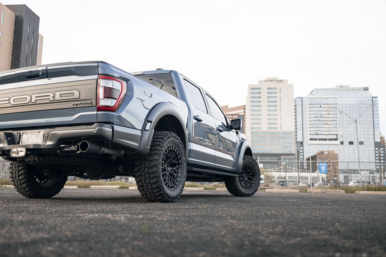 Rear view of 2022 Ford F150 Raptor with truck suv wheels