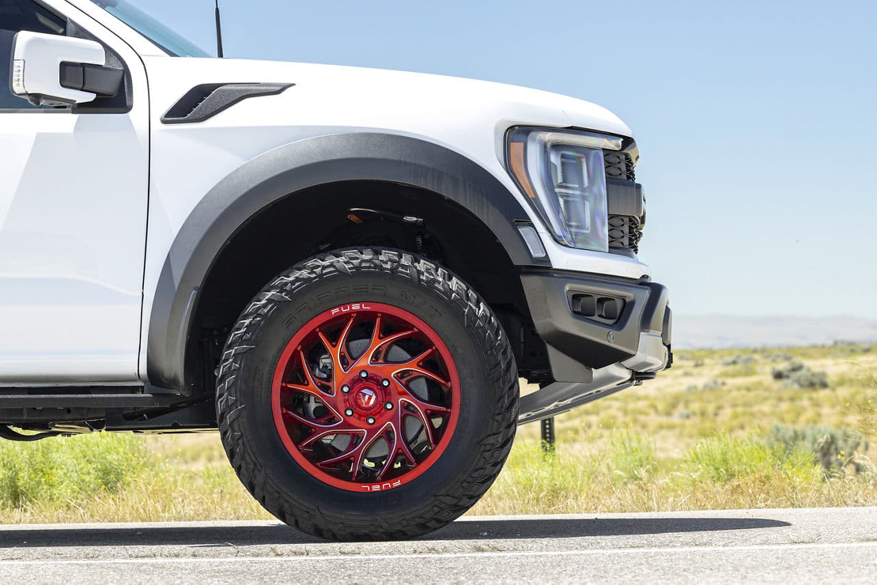 Side profile of 2022 Ford F150 Raptor with wheels