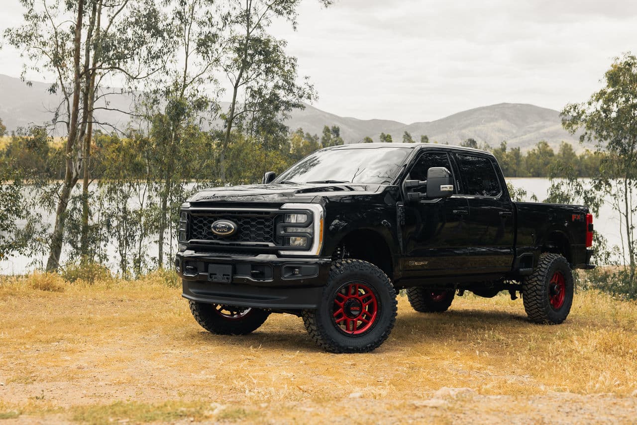 Front view of 2022 Ford F250 with vehicle wraps