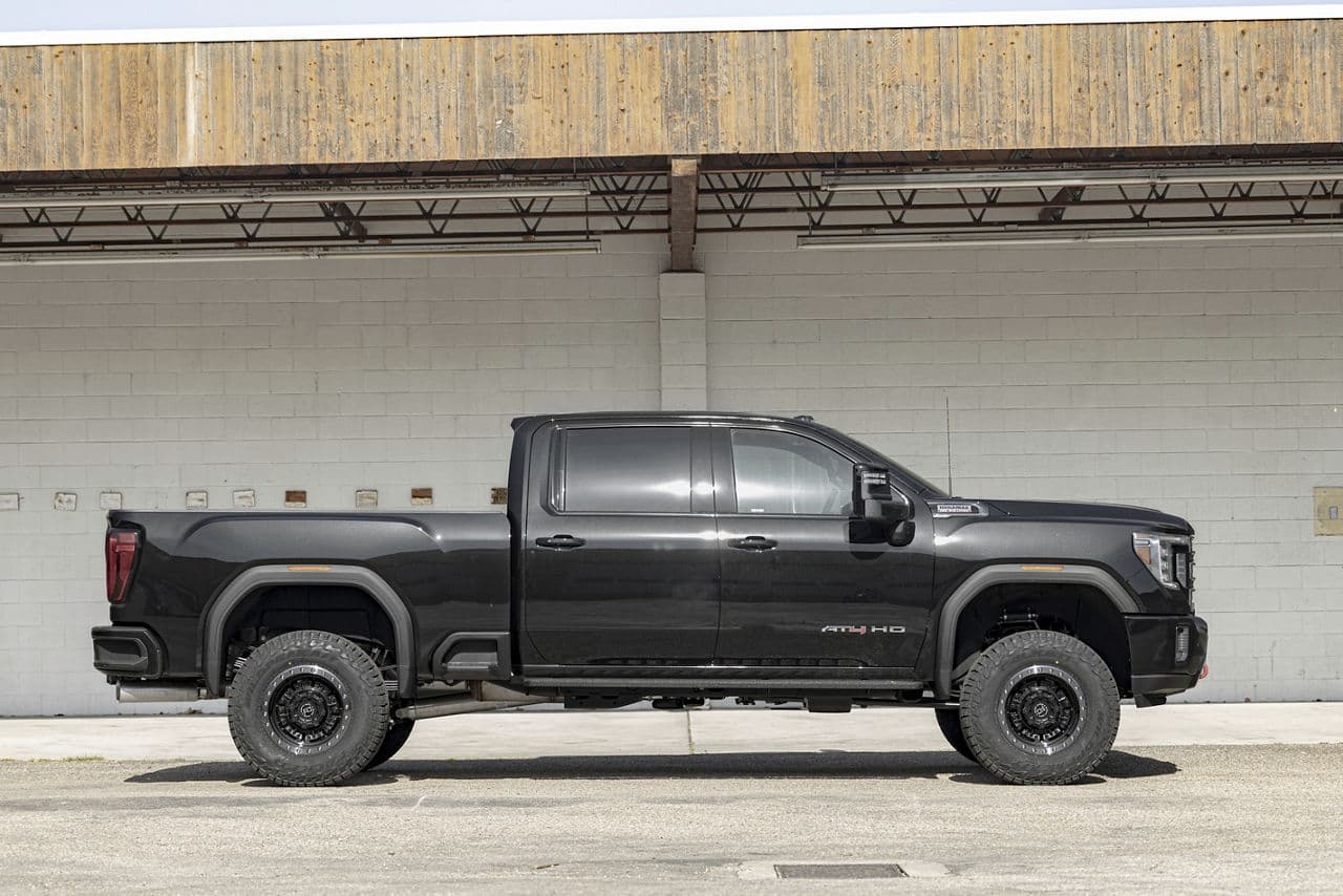 Rear view of 2022 GMC Sierra AT4 with truck suv wheels
