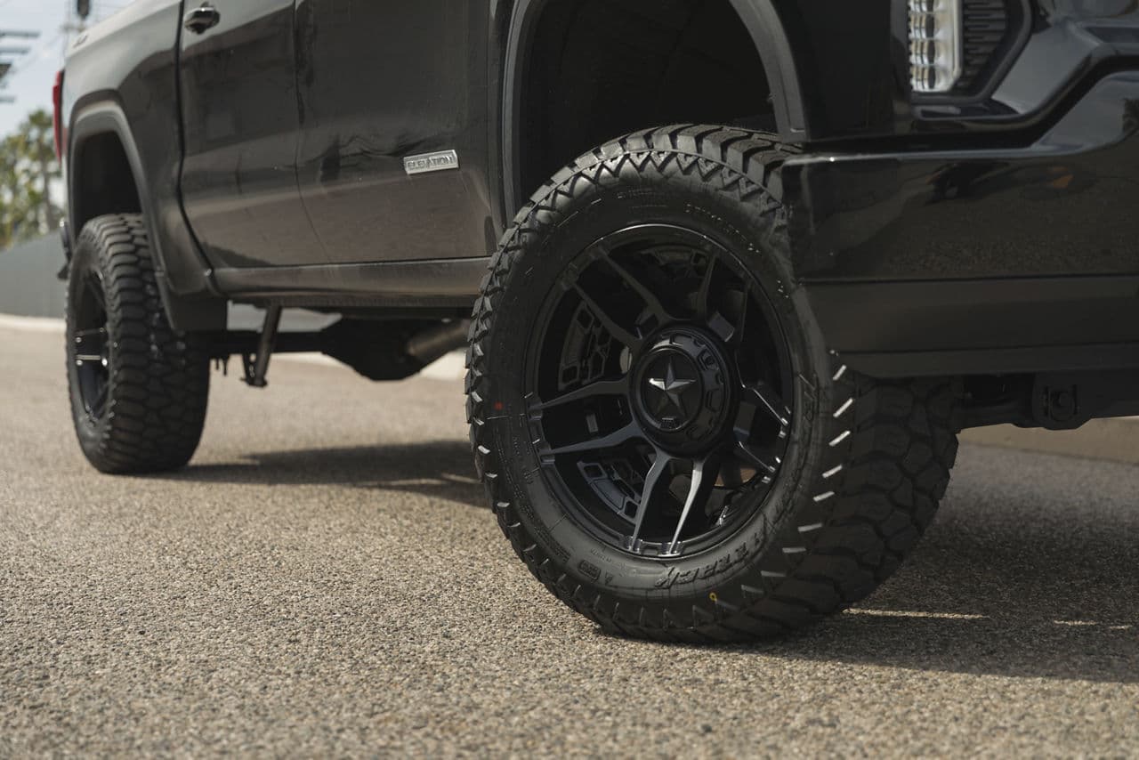 Rear view of 2022 GMC Sierra with wheels