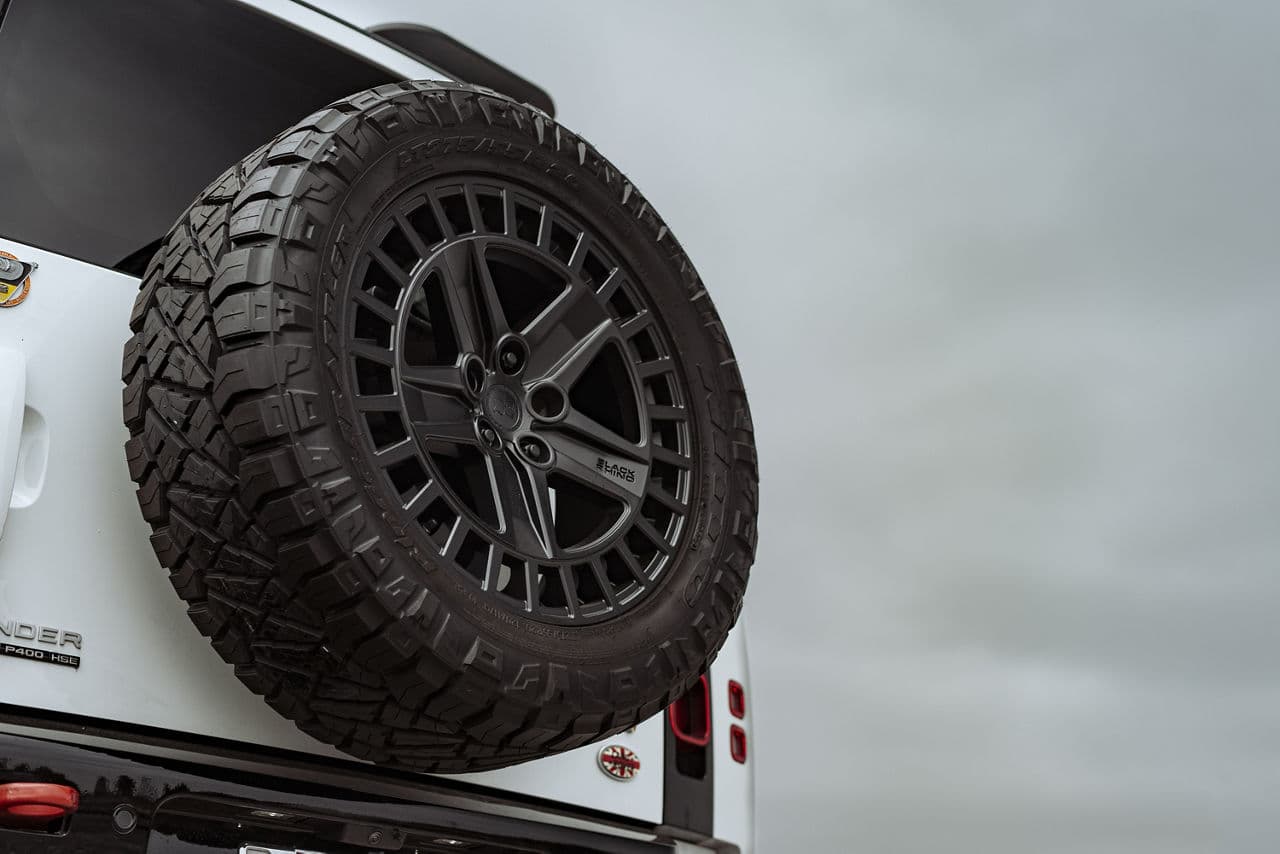Rear view of 2022 Land Rover Defender with wheels