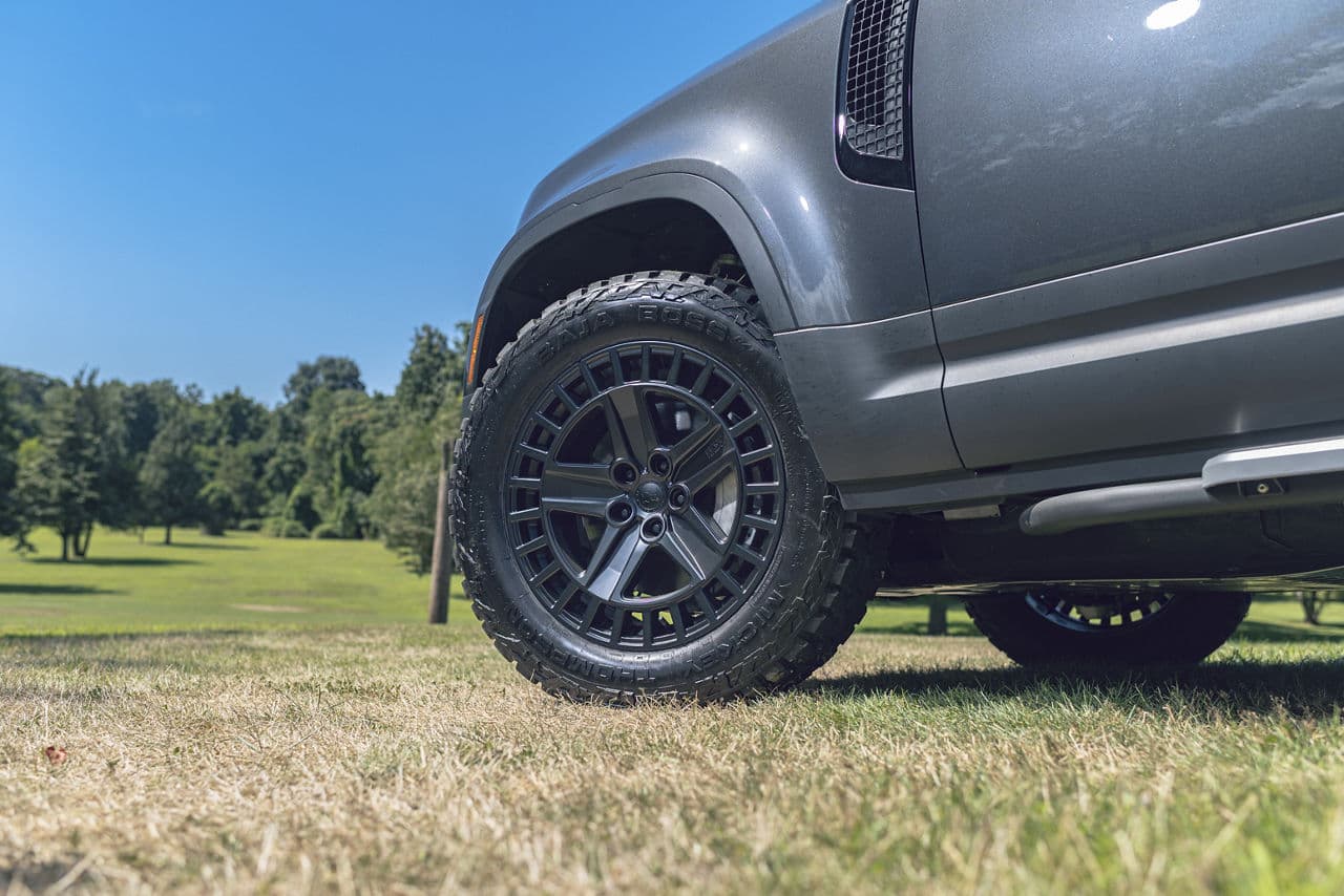 Rear view of 2022 Land Rover Defender with wheels