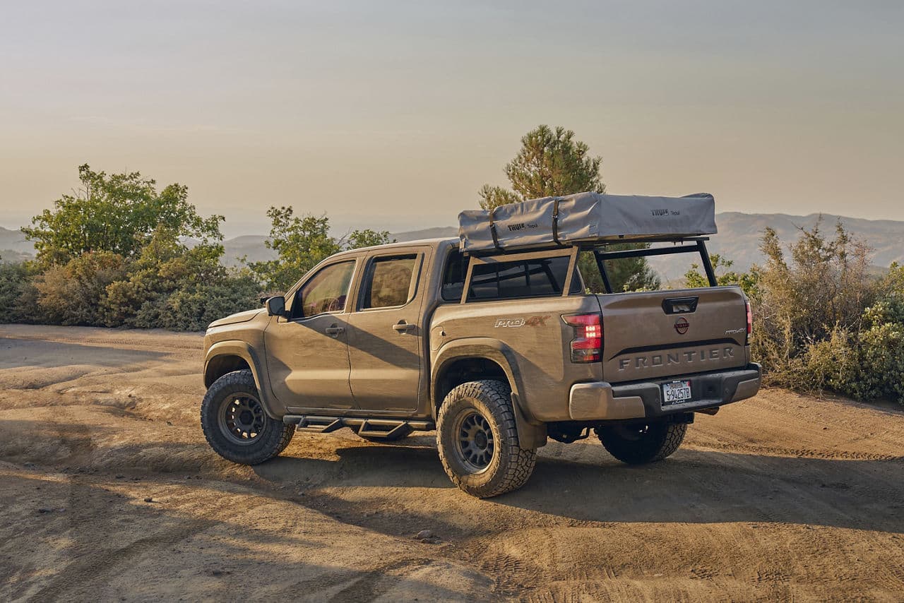 Front view of 2022 Nissan Frontier with truck suv wheels