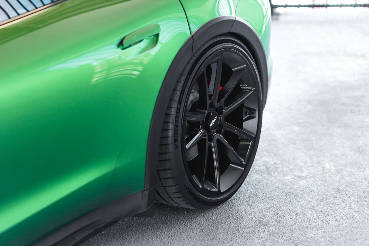Side profile of 2022 Porsche Taycan with wheels
