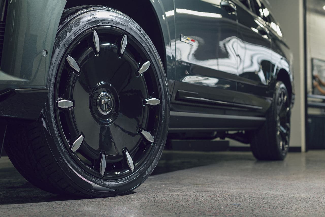Rear view of 2023 Cadillac Escalade with wheels