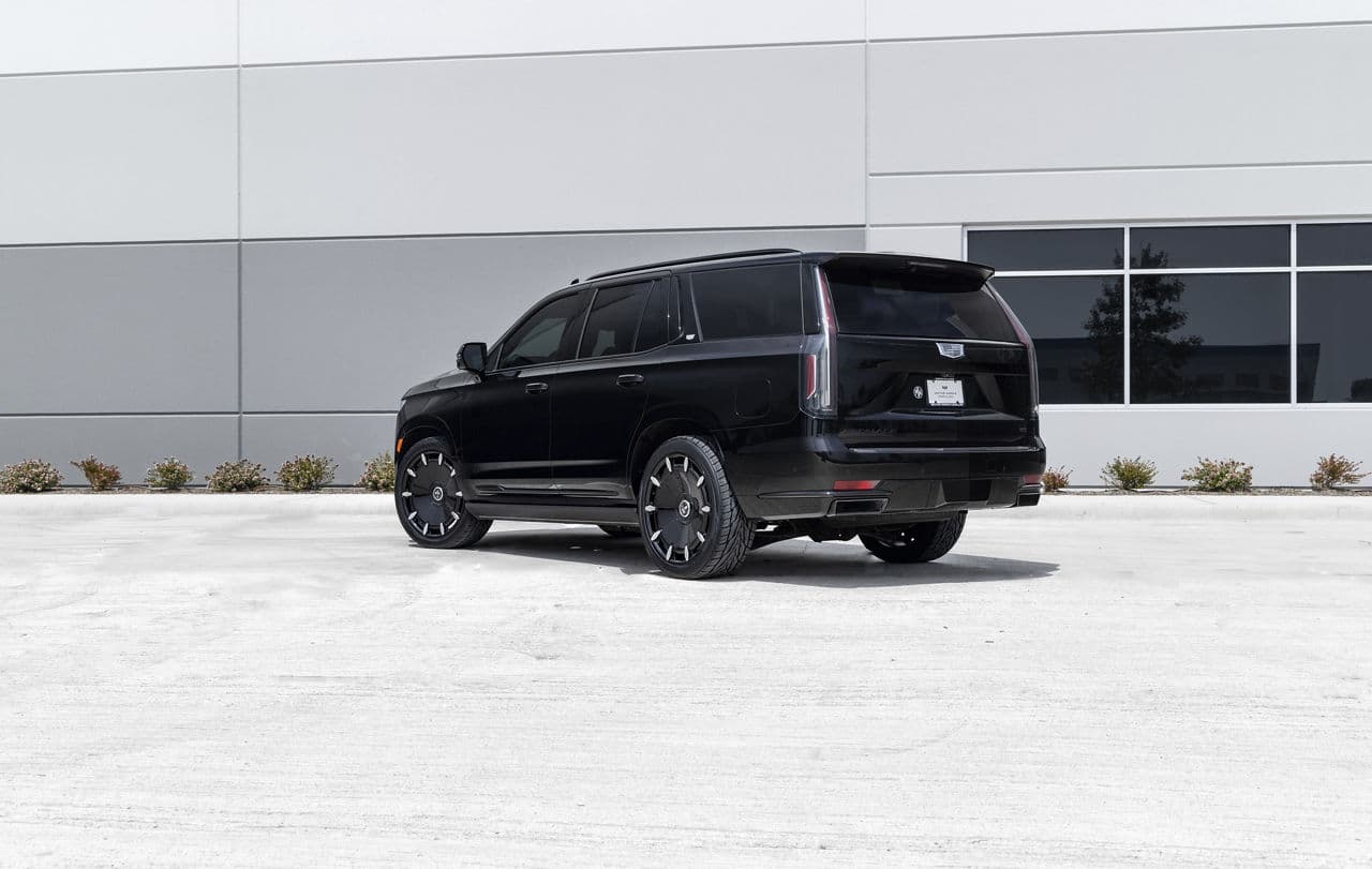 Rear view of 2023 Cadillac Escalade with wheels