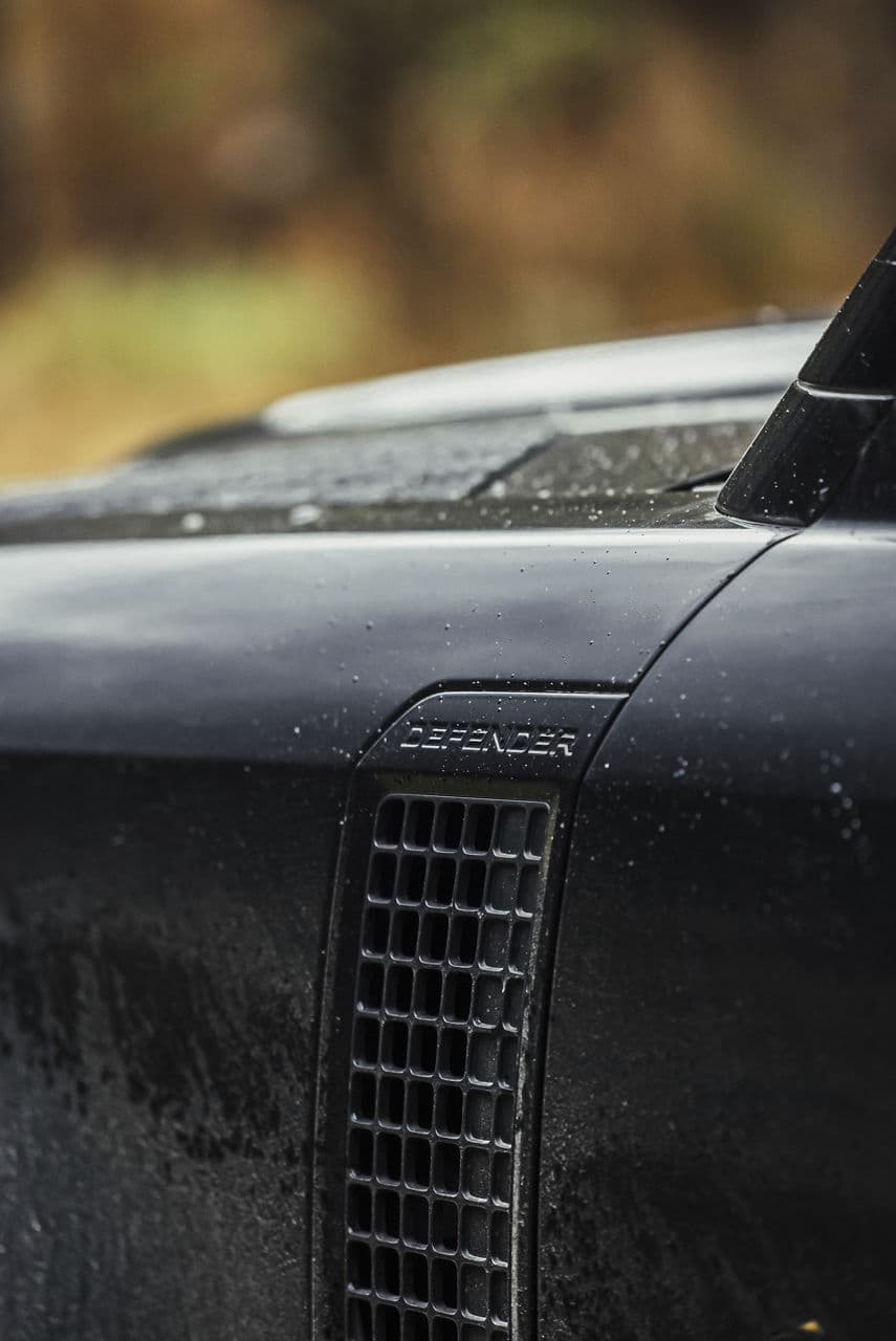 Side profile of 2023 Land Rover Defender 90 with wheels