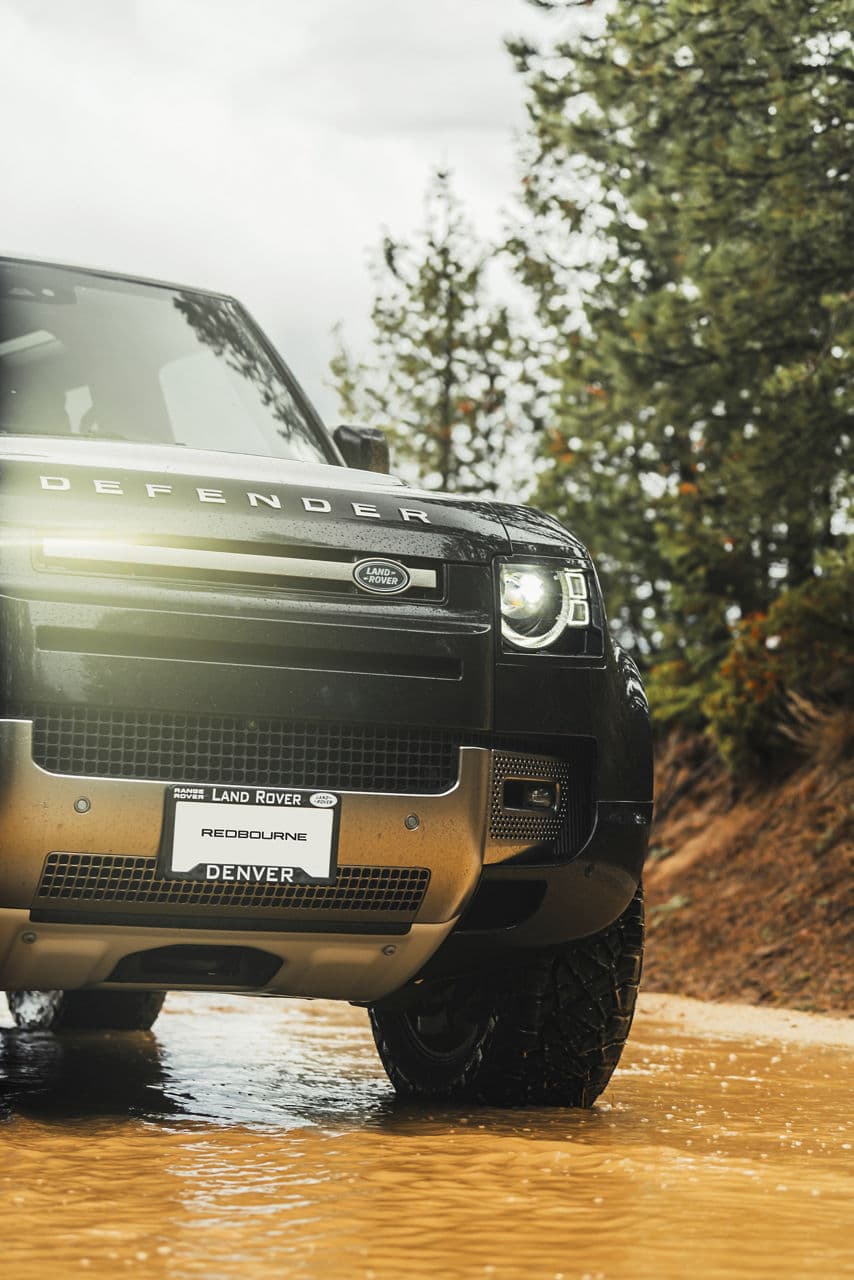 Rear view of 2023 Land Rover Defender 90 with wheels