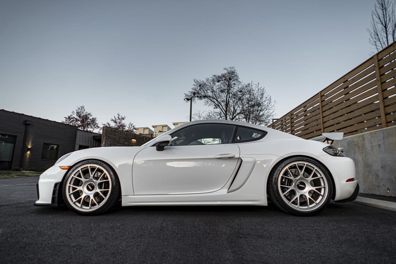 Rear view of 2023 Porsche 718 GT4 with wheels