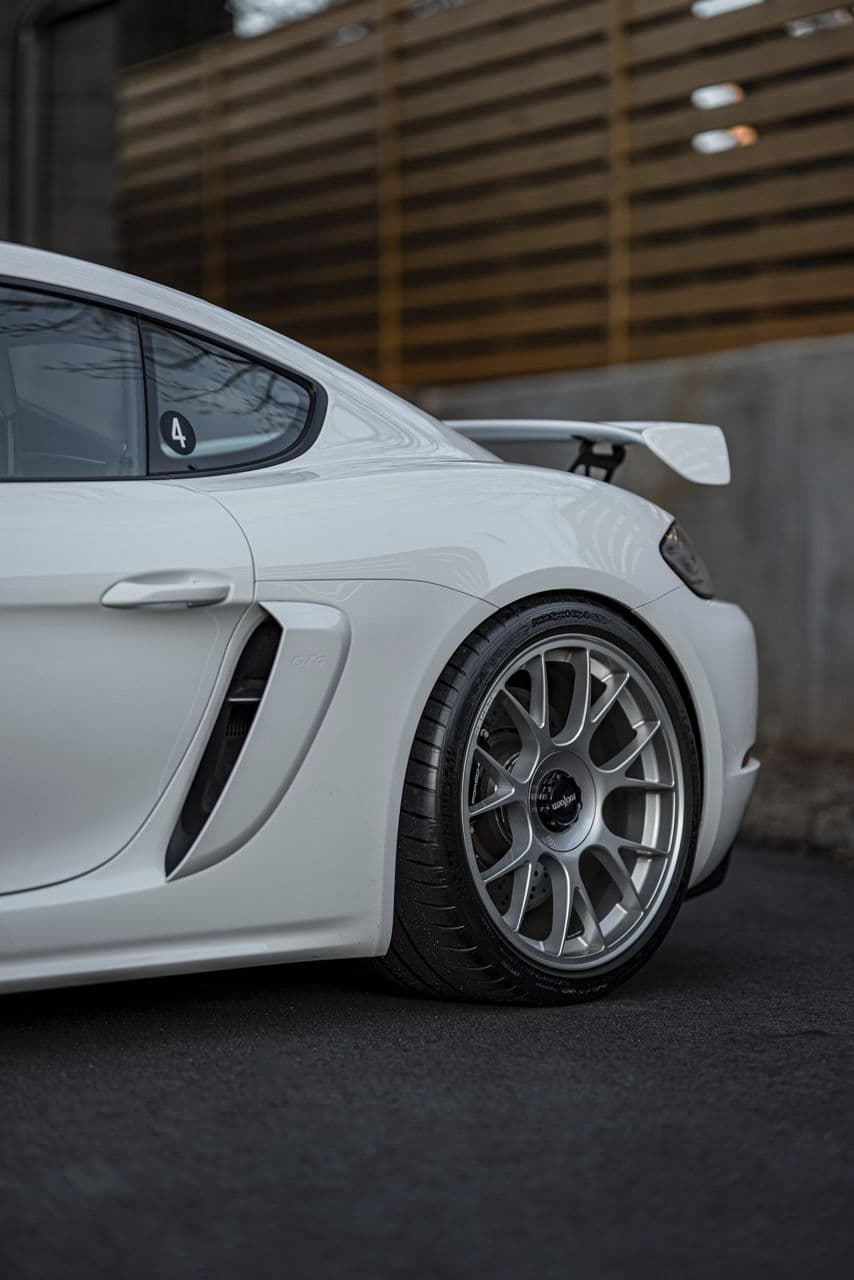 Interior of 2023 Porsche 718 GT4 with wheels
