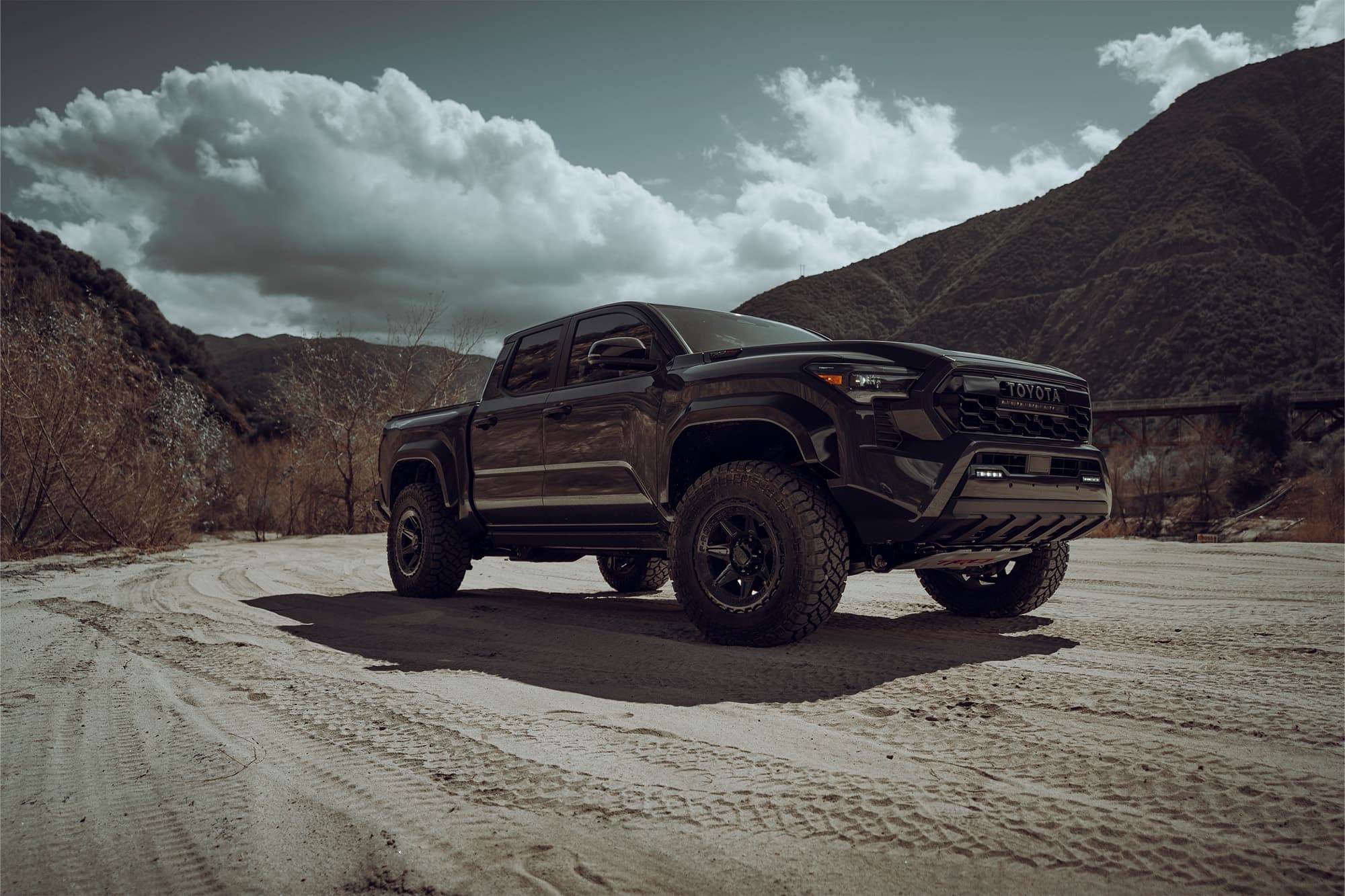 2024 Toyota Tacoma — lowering springs, rear view