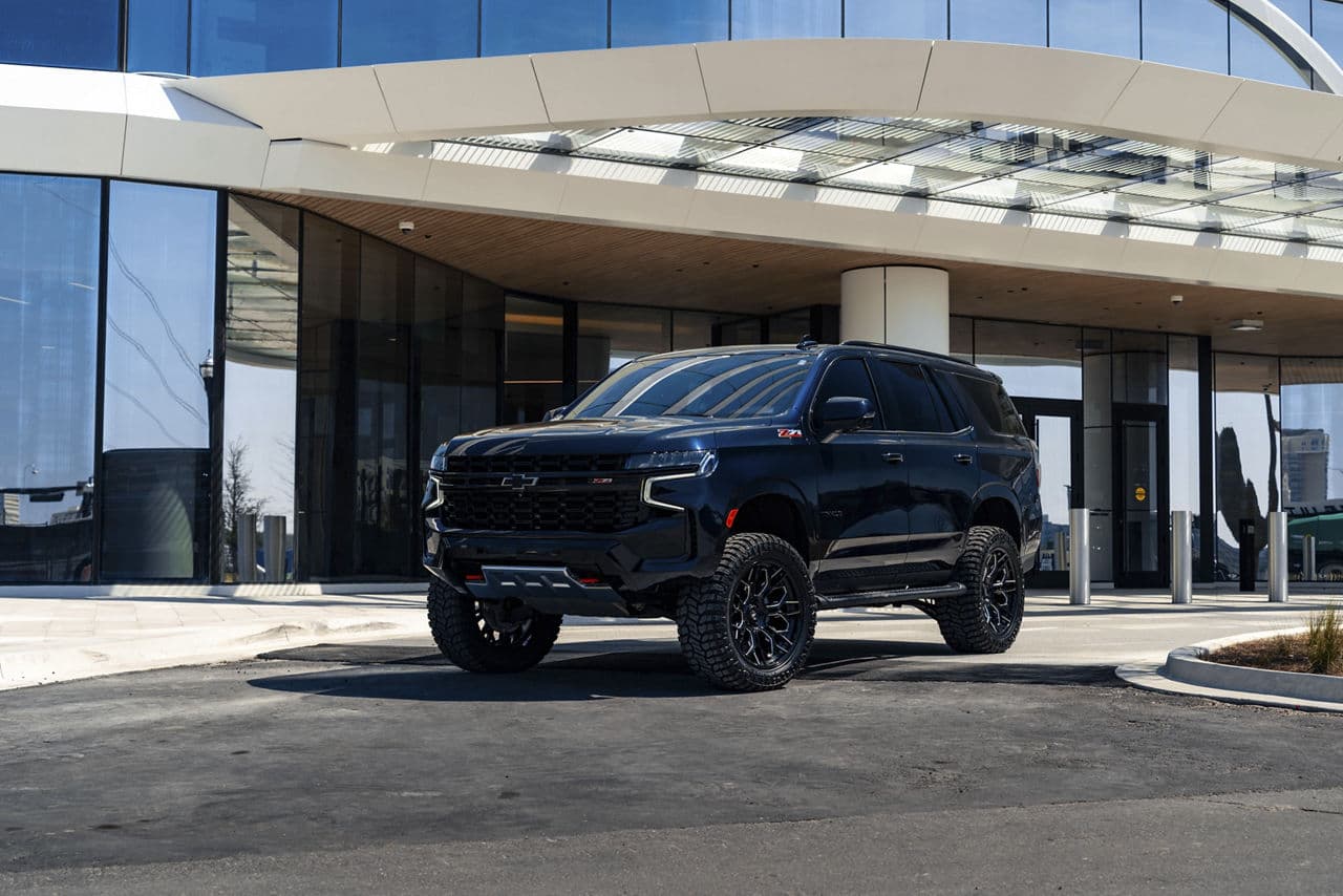 Lifted Chevrolet Tahoe Z71 with aftermarket wheels and tires - Irving TX