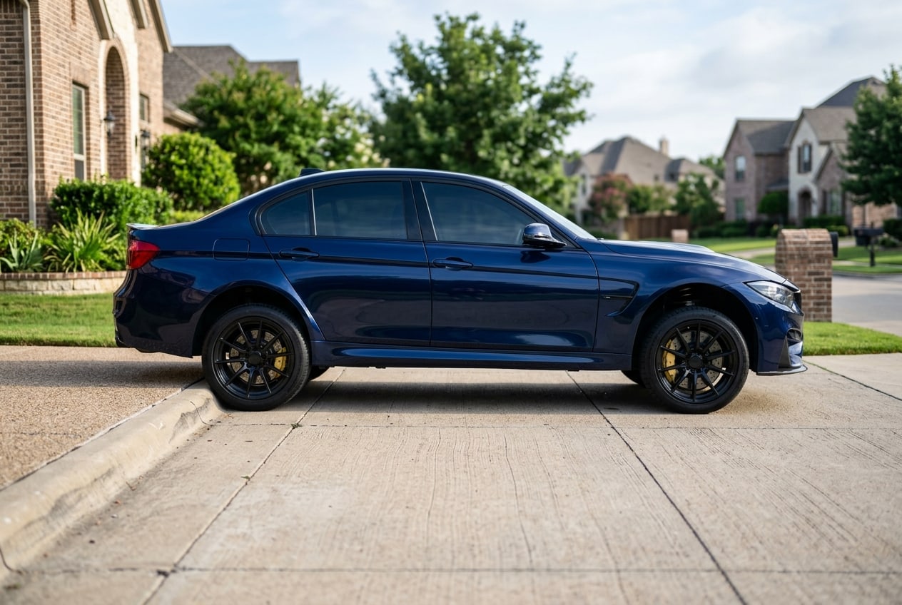 Performance sedan raised on air suspension for Is Air Suspension Reliable for Daily Driving in 2026 — Metroplex Customs, Irving TX